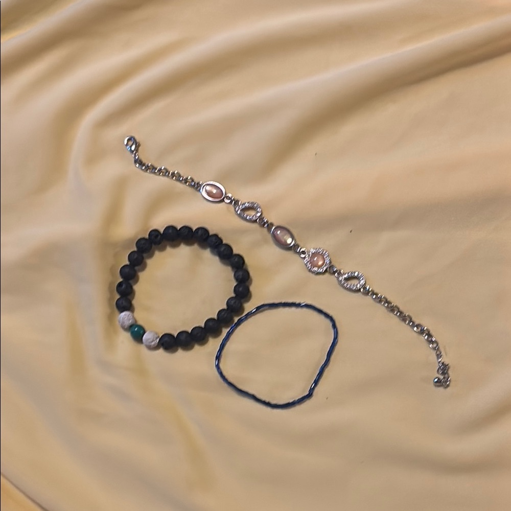 Sleek Silver and Black Bracelet with Intricate Detailing